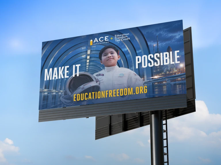 Make It Possible billboard mockup: a young astronaut and EducationFreedom.org